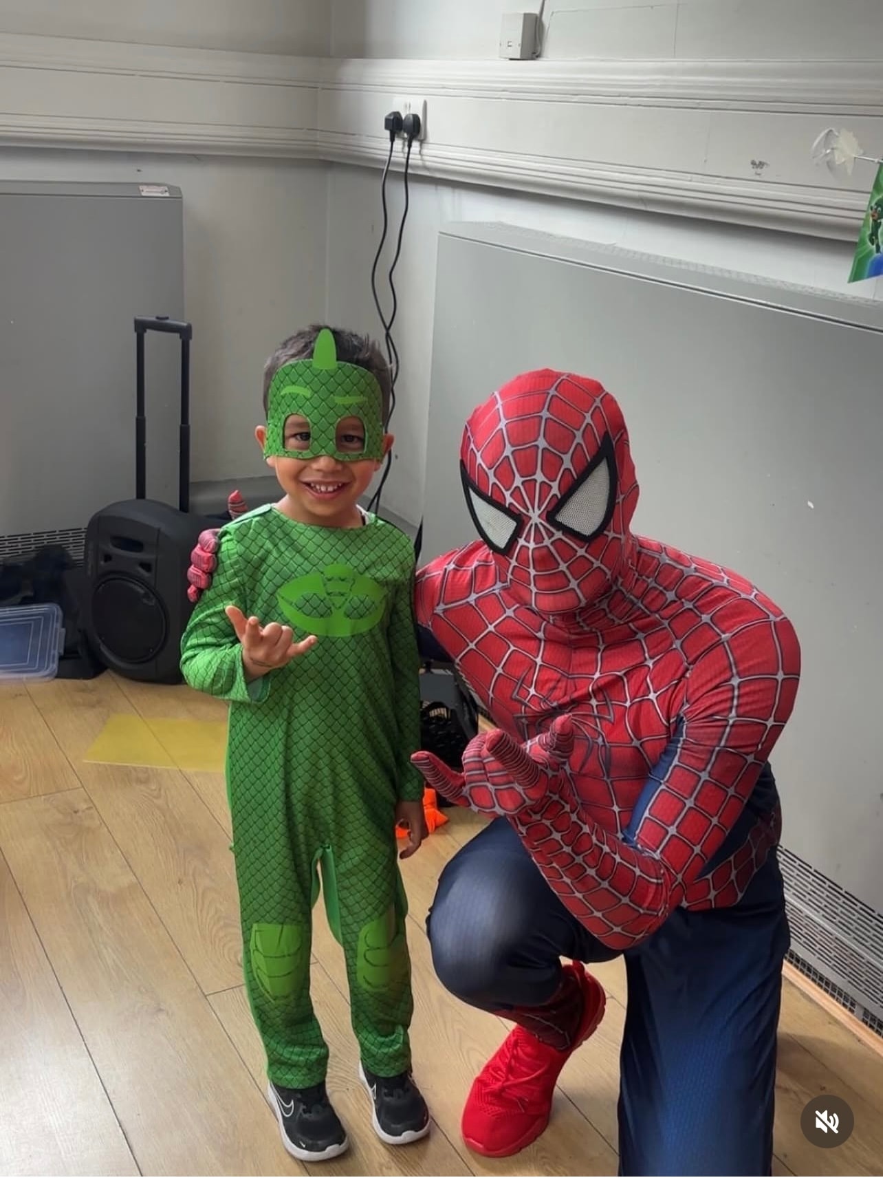 Gekko and Spider-Man at a party